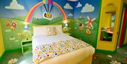 Stay in a colourful Bugbies room with separate areas for parents and children.