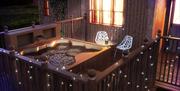 Bathing in your own hot tub at night!