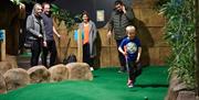 Family fun on the course at Adventure Mini Golf, Staffordshire