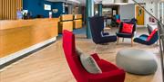 A look at the bright, spacious, and comfortably-furnished reception area