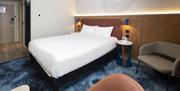 A view of a welcoming, comfortable bedroom at Ibis Styles Burton upon Trent