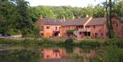 View across the lake to Foxtwood Cottages