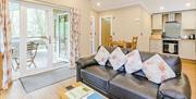 Enjoy home from home comforts in the well equipped pine lodges