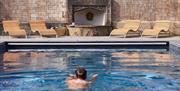 Enjoy a swim in the outdoor heated swimming pool at the Tawny Hotel, Staffordshire