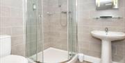 The bathroom in Room 2 at The Royal Oak, showing the sink, toilet and shower