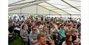 Crowds enjoy a packed programme of talks, tastings & demonstrations