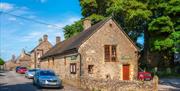 Exterior road side image of the village hall in Wetton