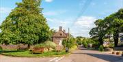 Wetton Village centre with wooden benches