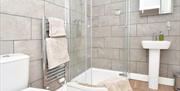 Bathroom with shower, sink and toilet