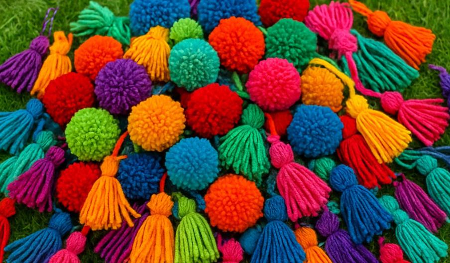 Pom poms being created at Crafty Attic for Yarn Tree art project Pom poms being created at Crafty Attic for Yarn Tree art project